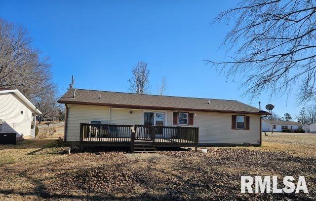 view of front of home with a wooden deck