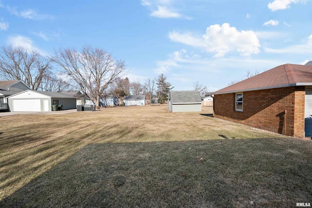 view of yard with a garage