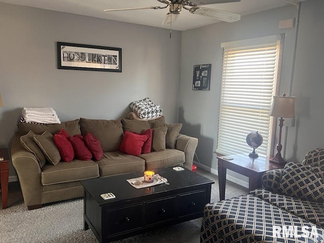 living room with carpet flooring and ceiling fan