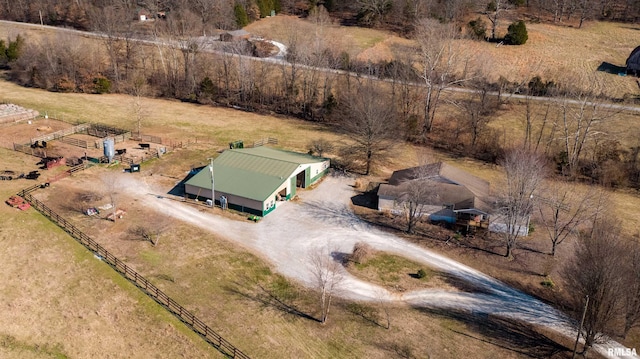 birds eye view of property featuring a rural view