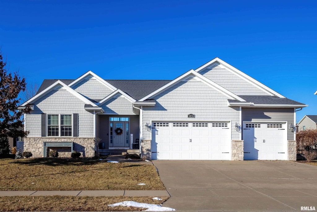 craftsman inspired home featuring a garage