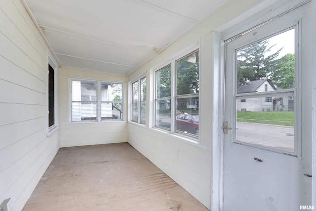 unfurnished sunroom featuring a healthy amount of sunlight