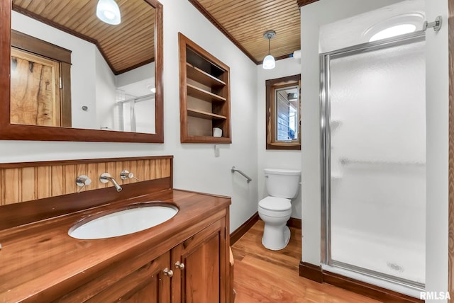 bathroom with toilet, wood ceiling, wood-type flooring, vanity, and a shower with door