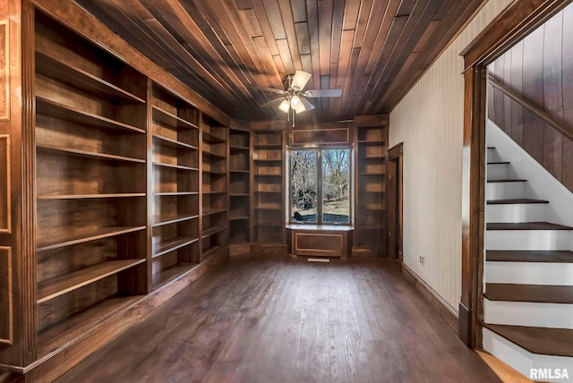 interior space with ceiling fan