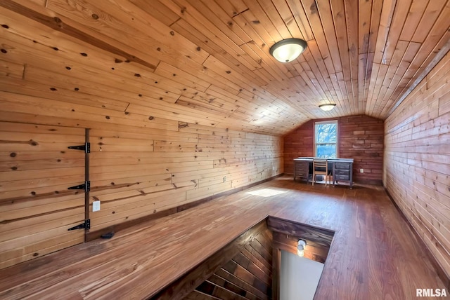 bonus room with wood walls, wood-type flooring, vaulted ceiling, and wooden ceiling