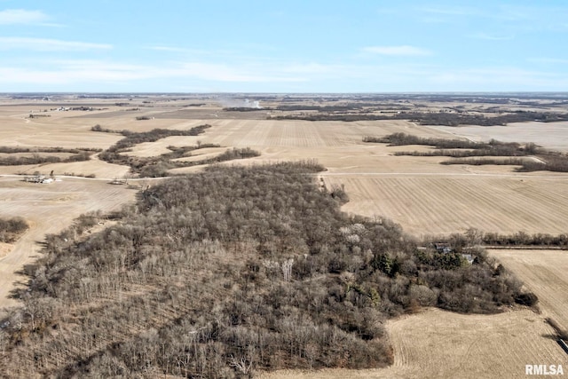 birds eye view of property with a rural view