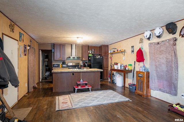 kitchen featuring wall chimney exhaust hood, dark hardwood / wood-style flooring, a kitchen island, and black appliances