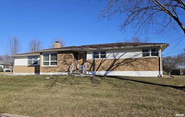 single story home with a front yard