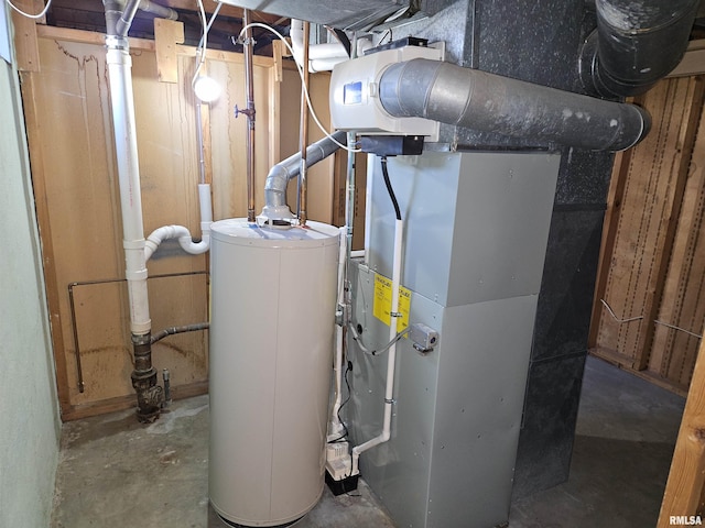 utility room with gas water heater