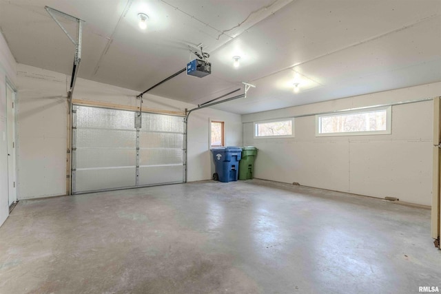 garage featuring a garage door opener