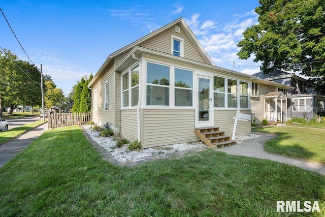 exterior space featuring a lawn