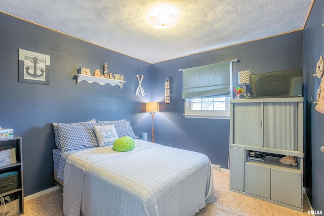 carpeted bedroom with baseboards