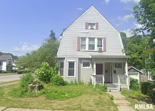 view of front facade featuring a porch and a front lawn