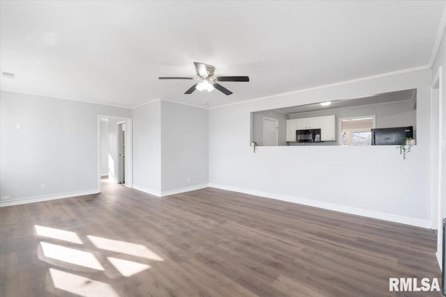 unfurnished living room featuring ceiling fan, baseboards, dark wood finished floors, and ornamental molding