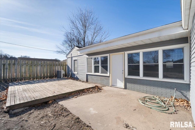 wooden deck featuring central AC and fence