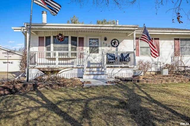 view of front of home featuring a porch and a front lawn