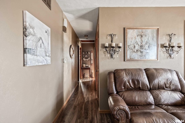 living room with dark hardwood / wood-style flooring