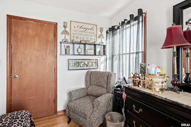 sitting room with light hardwood / wood-style flooring