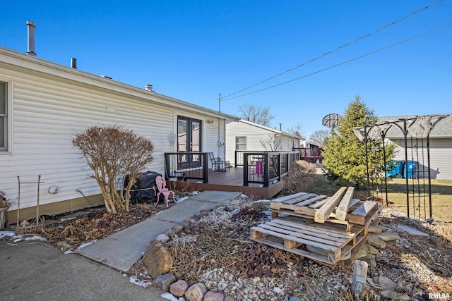 view of yard featuring a wooden deck