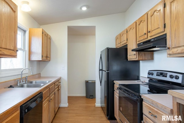 kitchen with stainless steel electric stove, dishwasher, lofted ceiling, sink, and light hardwood / wood-style floors