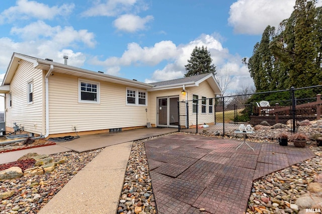 rear view of property with a patio