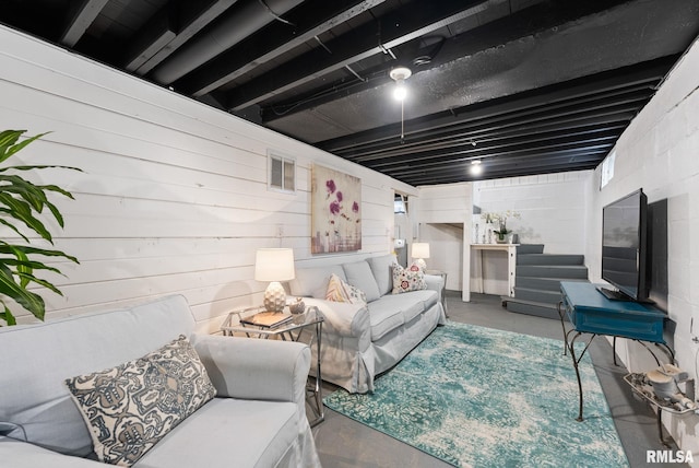 living room featuring concrete floors