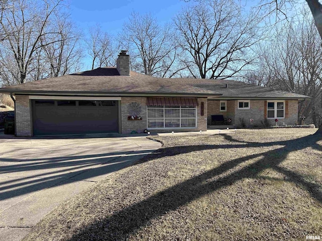 ranch-style home with a garage