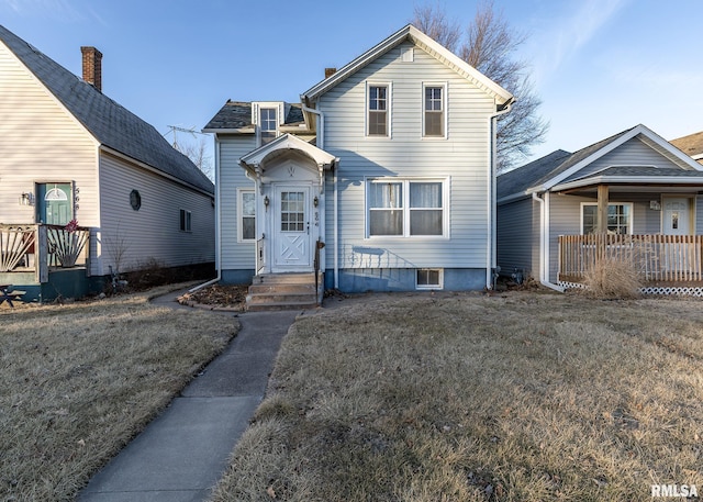 view of front property with a front lawn