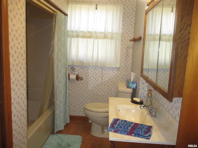 full bathroom with shower / bath combination with curtain, wood-type flooring, toilet, and vanity