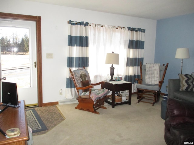 sitting room featuring carpet