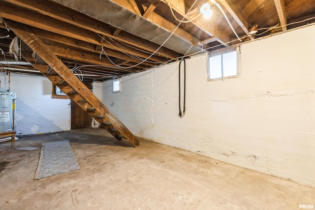 basement featuring electric water heater