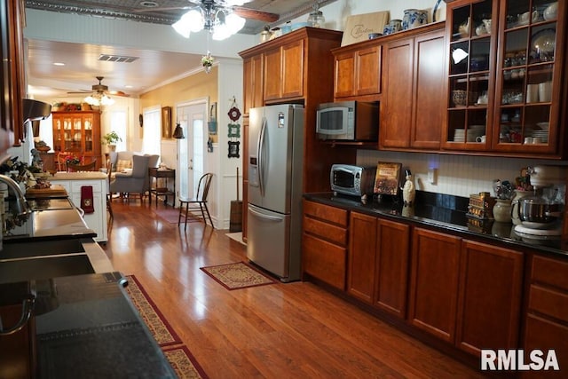 25065 Rock Springs Hollow Rd, Thebes, IL 62990 - kitchen with a sink, ceiling fan, appliances with stainless steel finishes, and wood finished floors