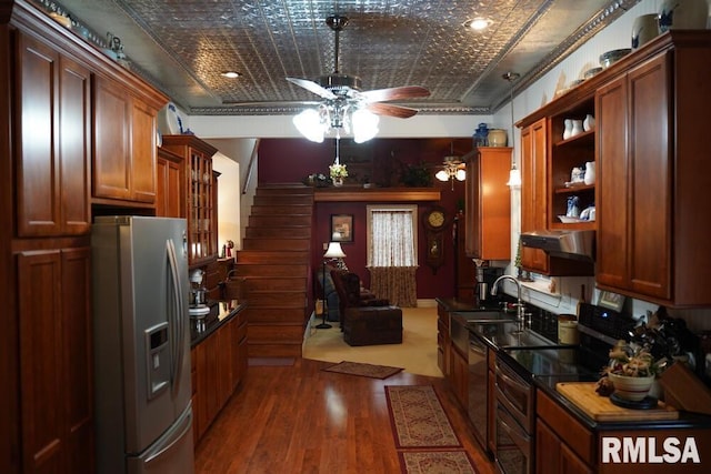 25065 Rock Springs Hollow Rd, Thebes, IL 62990 - kitchen featuring open shelves, dark countertops, ceiling fan, under cabinet range hood, and stainless steel appliances