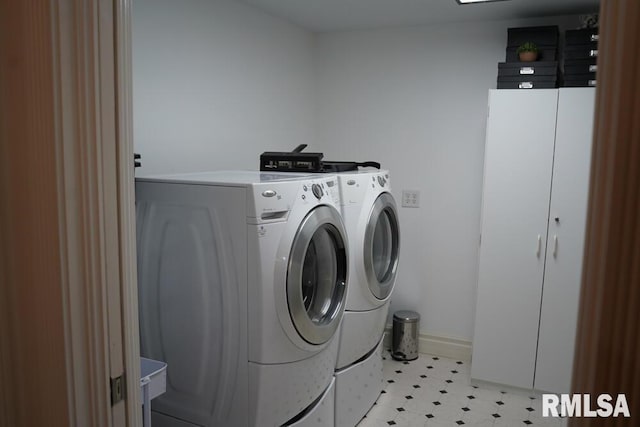25065 Rock Springs Hollow Rd, Thebes, IL 62990 - clothes washing area with laundry area, washing machine and dryer, baseboards, and light floors
