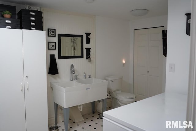 25065 Rock Springs Hollow Rd, Thebes, IL 62990 - bathroom with baseboards, a closet, and toilet