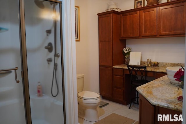 25065 Rock Springs Hollow Rd, Thebes, IL 62990 - bathroom with vanity, tile patterned floors, a stall shower, and toilet