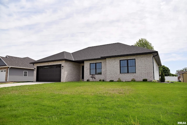 2500 Taylor Dr, Quincy, IL 62305 - view of front of home with a garage, brick siding, a front lawn, driveway, and roof with shingles