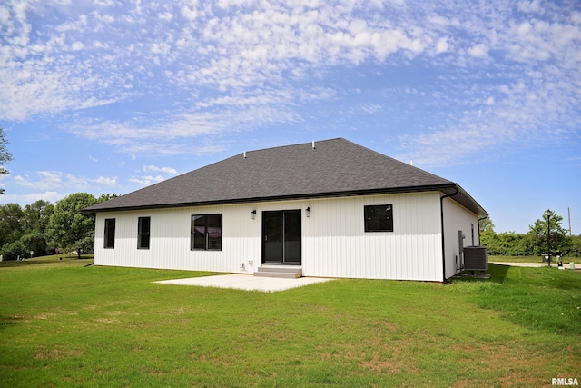 2500 Taylor Dr, Quincy, IL 62305 - back of house with central AC unit, a patio, a yard, and a shingled roof
