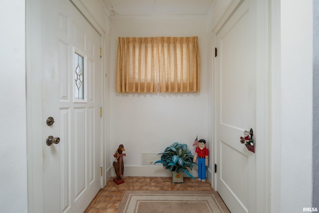 doorway to outside with ornamental molding