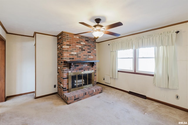 unfurnished living room with a brick fireplace, crown molding, and light colored carpet