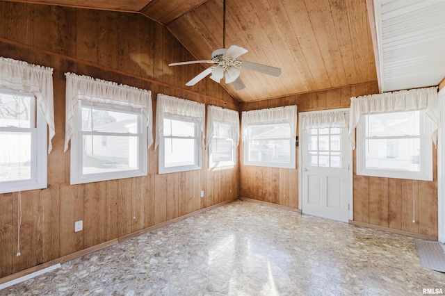 unfurnished sunroom featuring lofted ceiling, wooden ceiling, and ceiling fan