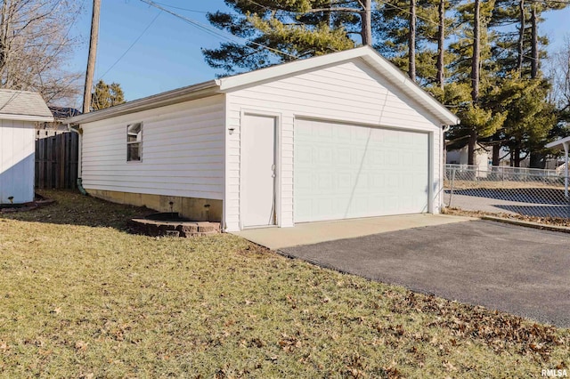 garage with a lawn