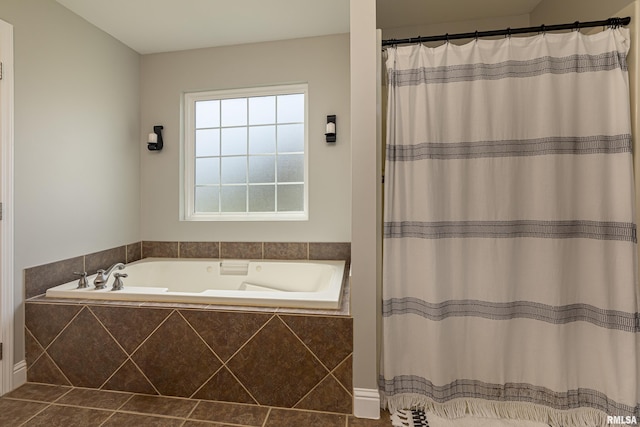 bathroom with tiled tub