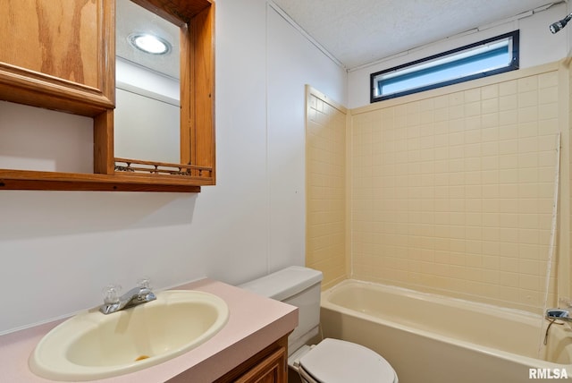 full bathroom with vanity, bathtub / shower combination, a textured ceiling, and toilet