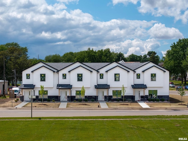 1006 S 4th St, Clinton, IA 52732 - modern inspired farmhouse with a front yard
