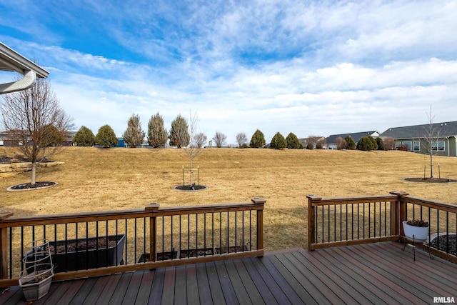 wooden deck with a yard