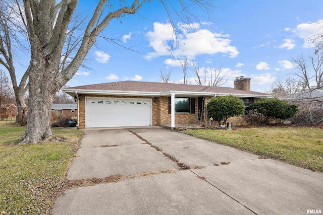 ranch-style home featuring a garage and a front yard