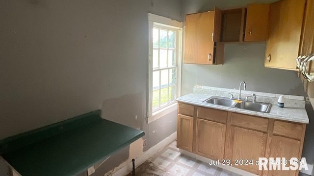 kitchen with sink and a wealth of natural light