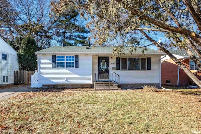 single story home with a front yard