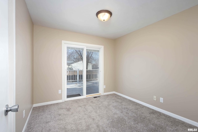 view of carpeted spare room